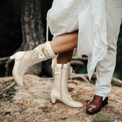 Bride wearing beige renaissance mid heel zipper boots with wedding gown for bridal occasion