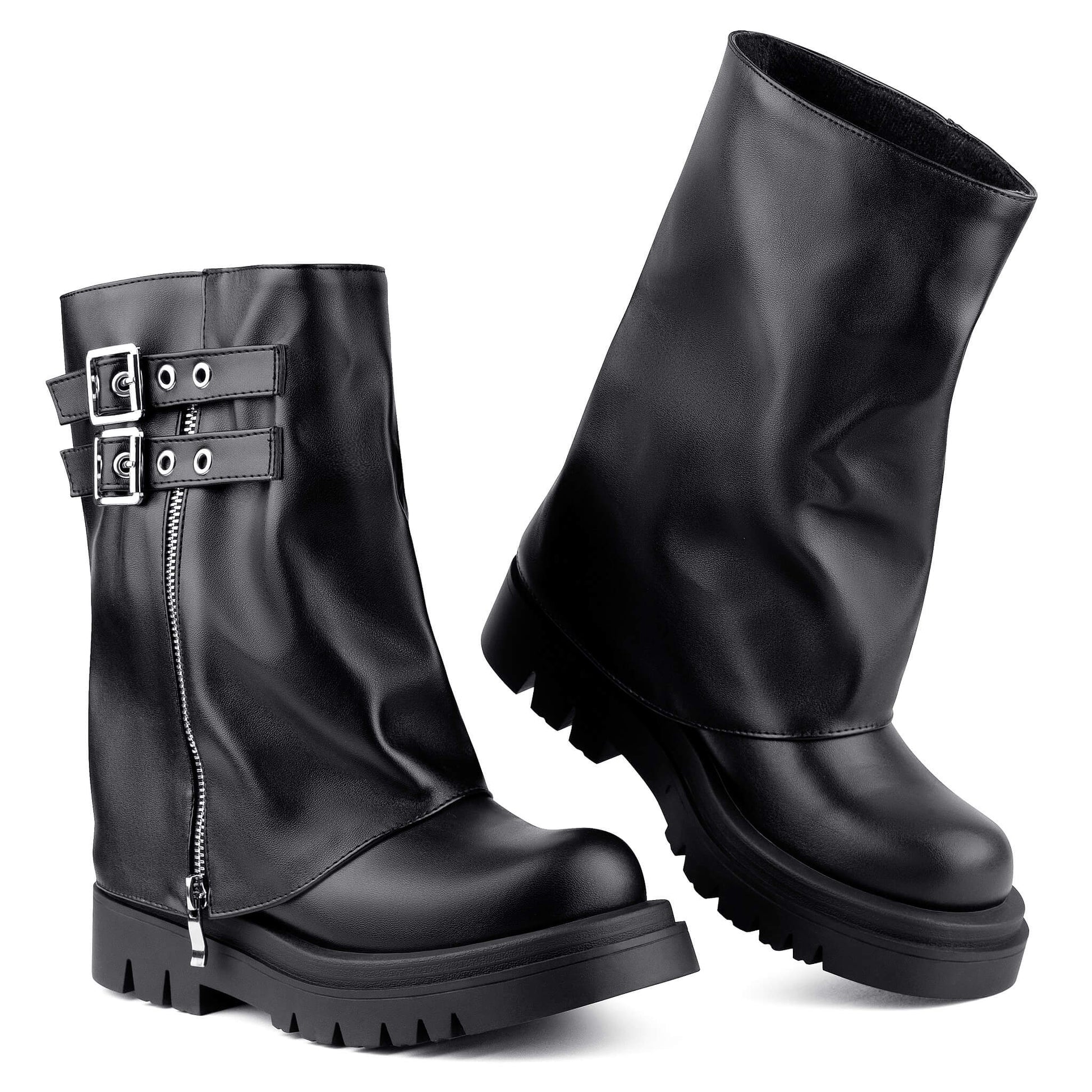 Pair of black fold over buckle moto mid calf biker boots on white background, round toe, lug sole and metal buckle details