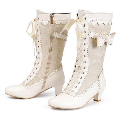 Flat lay pair of beige renaissance mid heel zipper bridal boots on white background