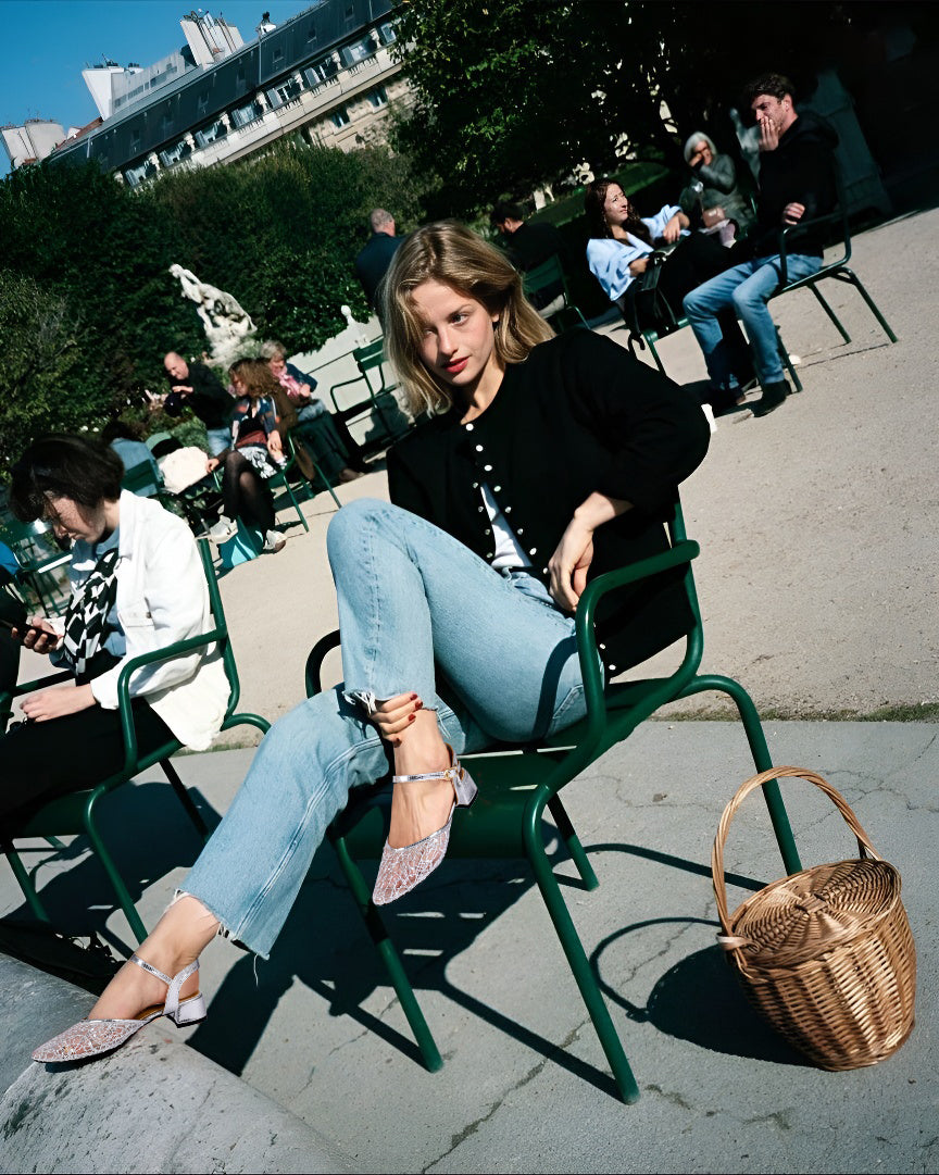 Silver mesh glitter pointed toe sandals with chunky heel, styled with jeans and black cardigan for casual city park look