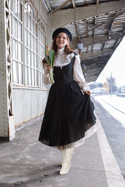 Lady wearing renaissance mid heel zipper bridal boots paired with evening dress for wedding and party wear