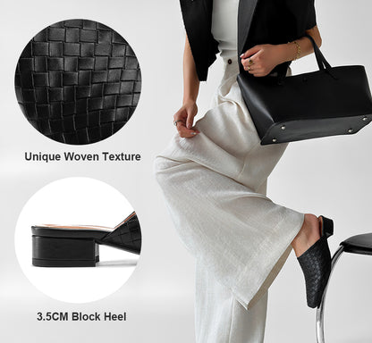 Woman wearing black woven mules with white linen pants for office casual look